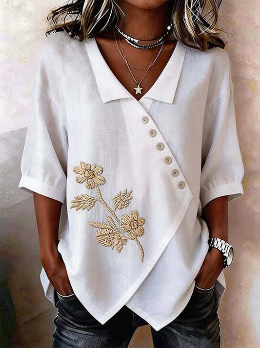 Valeria - Blusa asimétrica con bordado floral