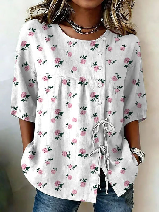 Lucía - Blusa floral con detalle ajustable lateral