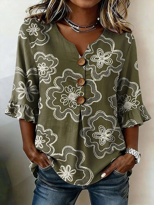 Martina - Blusa floral con botones y manga volante
